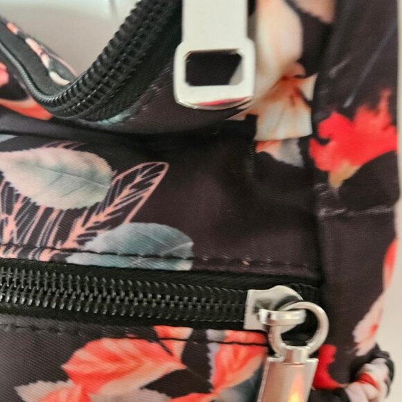Black nylon w/ floral design shoulder bag w/ multiple pockets/compartments. - Picture 5 of 7